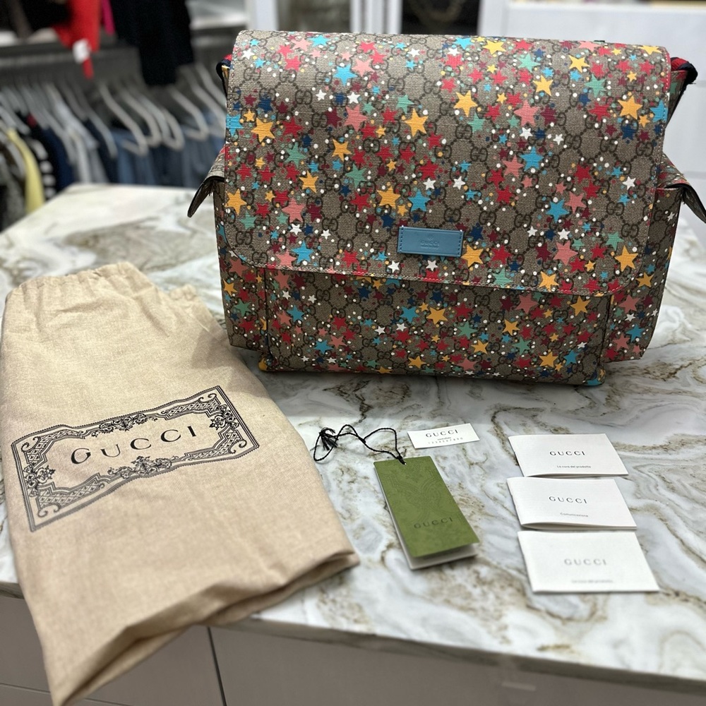Gucci GG Supreme Star Monogram coated canvas diaper bag.  Limited Addition